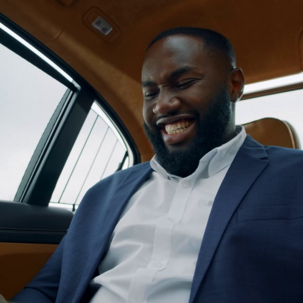 videoblocks-closeup-black-man-counting-money-cash-at-luxury-car-successful-african-business-man-celebrating-victory-at-backseat-excited-afro-man-holding-cash-money-in-hands-at-vehicle_hkrclsr